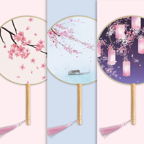 An ancient-style wooden-handled half-transparent Hanfu round fan with Chinese architectural elements, featuring a wooden handle and silk gauze, suitable for photography.