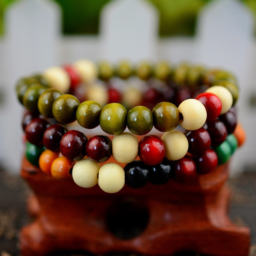 2 yuanes tienda puesto suministro 8MM sándalo solo anillo Buda cuentas pulsera Buda palabra cuentas de madera pulsera al por mayor