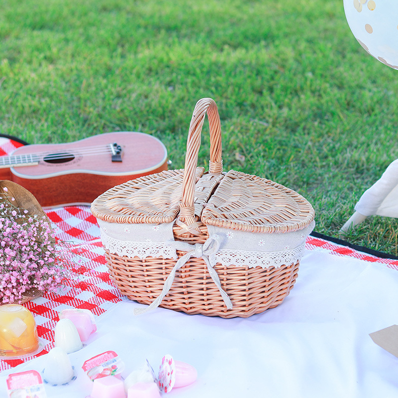Cesta de almacenamiento de ratán directo de fábrica cesta de fruta de picnic portátil al aire libre cesta de mimbre tejida a mano cesta portátil