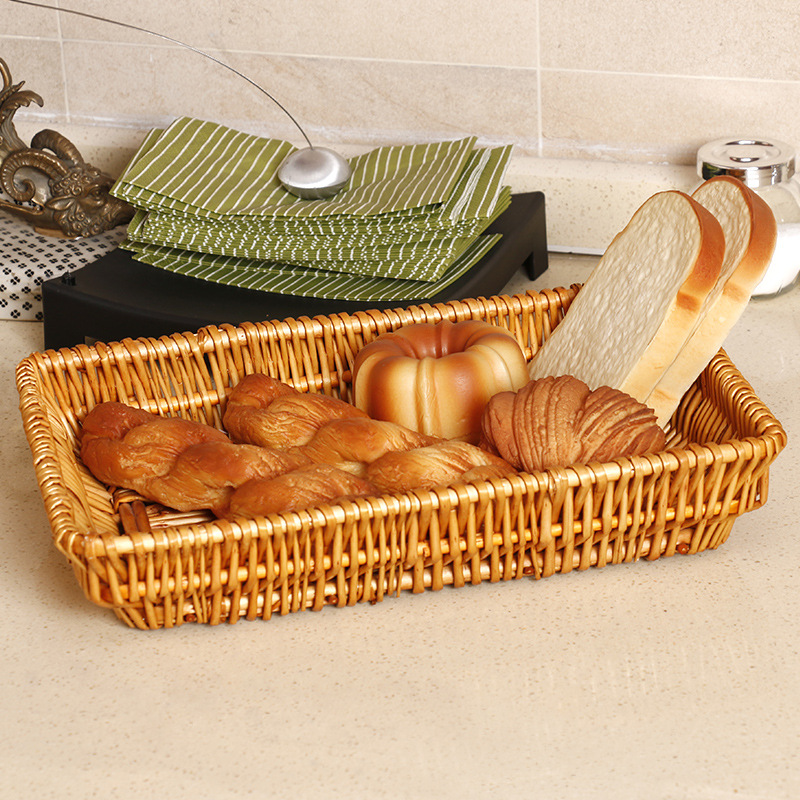 Fábrica directa fruta cesta ratán tejido nórdico drenaje Placa de almacenamiento rectangular nueva mano creativa cesta tejida