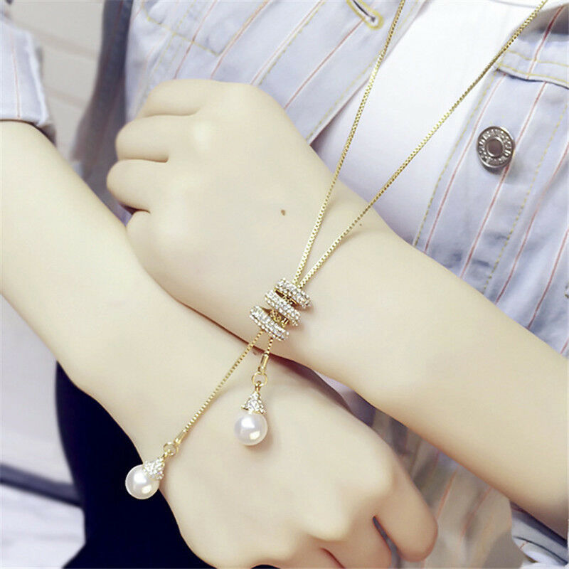 Nuevo estilo largo simple perla espiral colgante largo COLLAR COLGANTE todo-fósforo diamante borla suéter cadena para las mujeres al por mayor image 3