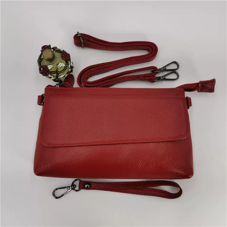 头层牛皮真皮女包2025新款百搭休闲小盖头手拿包斜挎小包厂家批发