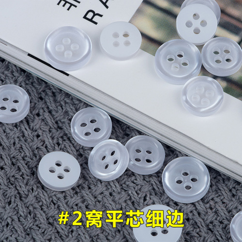 Four-eye button, pearlized shirt with wide-edge collar, resin buttons, flat-bottomed, wavy design, off-white base, and fine-edged shirt fasteners