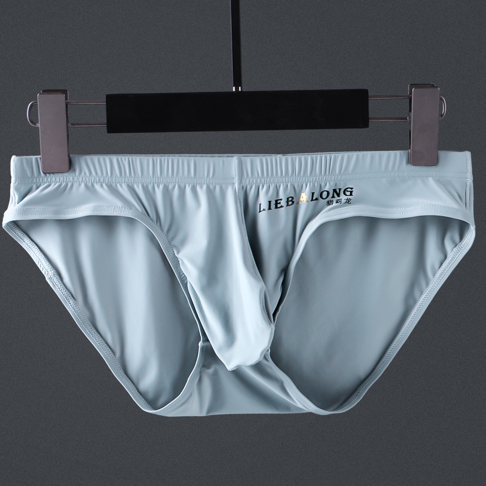 Calzoncillos de seda de hielo cintura baja de los hombres sexy ropa interior de los hombres delgados pantalones cortos de bolsillo de choque hombres jóvenes moda al por mayor entrega