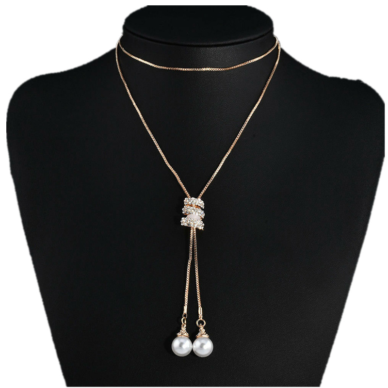 Nuevo estilo largo simple perla espiral colgante largo COLLAR COLGANTE todo-fósforo diamante borla suéter cadena para las mujeres al por mayor image 6