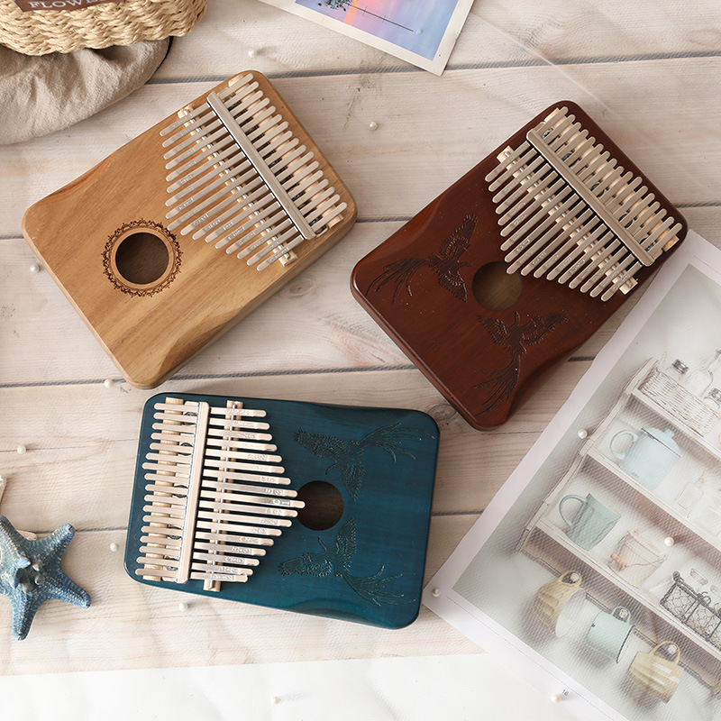 Pulgar de Amazon Kalinba Piano de 17 tonos Instrumentos musicales para niños Estudiantes Pulgar de madera maciza Piano de dedo para principiantes