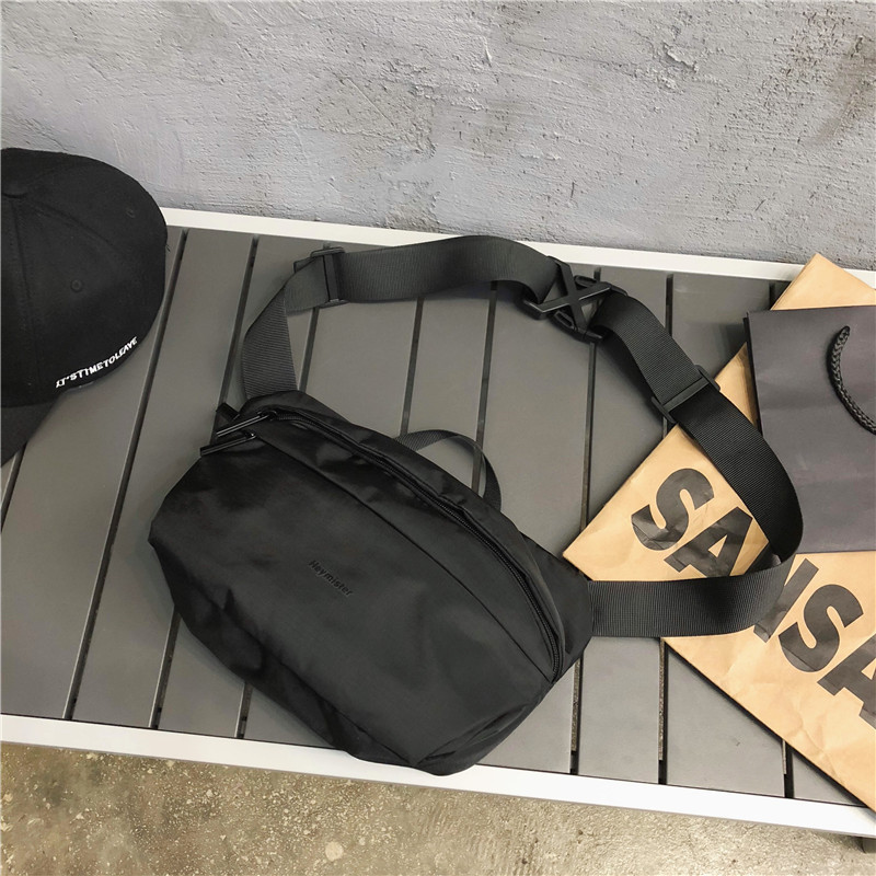 Bolsa de mensajero marca de moda para hombres ins bolsa de pecho de celebridades de Internet moda de la calle de las mujeres bolsa de hombro del todo fósforo bolsa pequeña casual japonesa