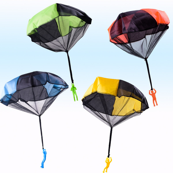 Spot children hand tossing parachutes
