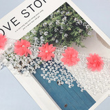 Точечная подача цветной вышитой воды -сосуществуемая марля