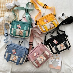 斜め掛けの女性の新型の小さいカバンのかわいい少女のキャンバスの学生の日系の文芸の韓国のinsのシングル肩の小さい方のカバン