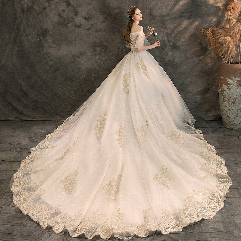 Nuevo vestido de novia 2026 para novias de baja estatura, vestido de princesa francés de estilo forestal con hombros descubiertos, ideal para fotografía de viajes.