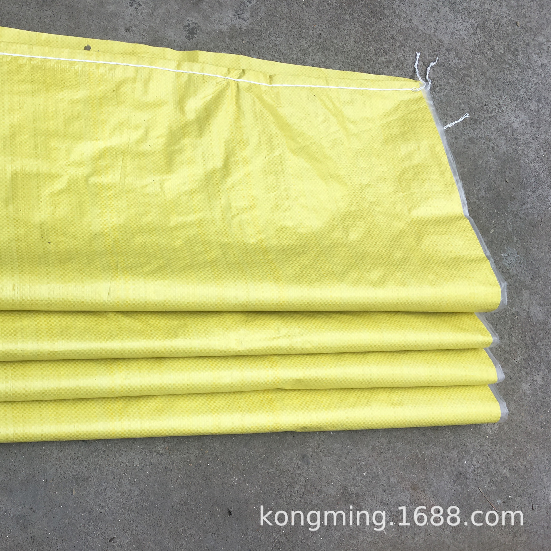 批发亮黄覆膜物流包装蛇皮袋义乌快递打包塑料麻袋编织袋