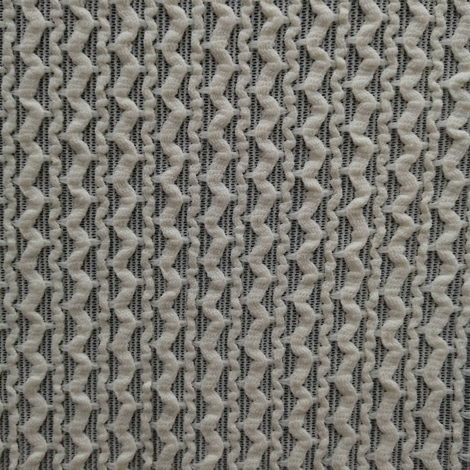 2020爆款针织面料特价涤纶粗针提花网布女装童装布料【欢迎议价】