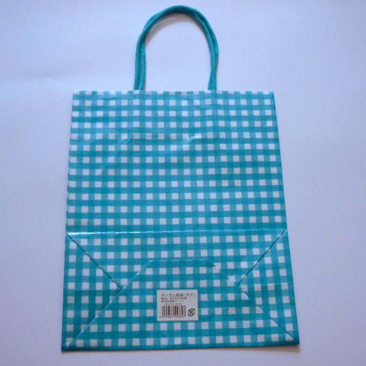 厂家直供包布纸绳提手120克白牛皮复合亮膜礼品袋覆膜牛皮纸袋