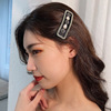 Black retro hairgrip, bangs from pearl, Chanel style