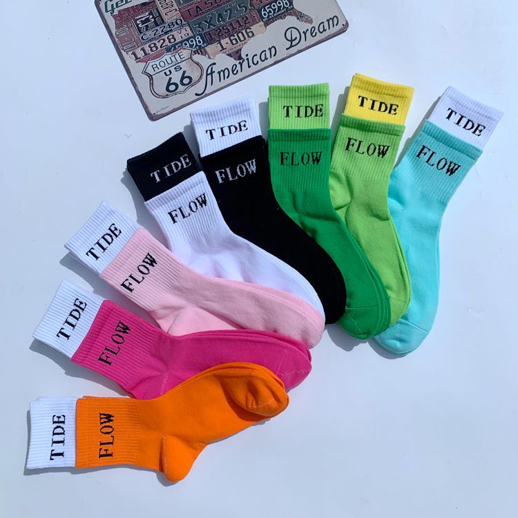 South Korea mid-calf couple sports socks hip hop skateboard men and women European and American Japanese sports letter cotton stockings factory batch