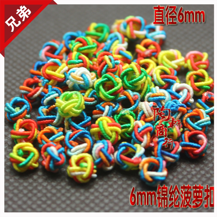 Venta al por mayor piña hebilla DIY material hecho a mano piña nudo chino nudo accesorios 6mm nylon piña nudo bolsa hebilla