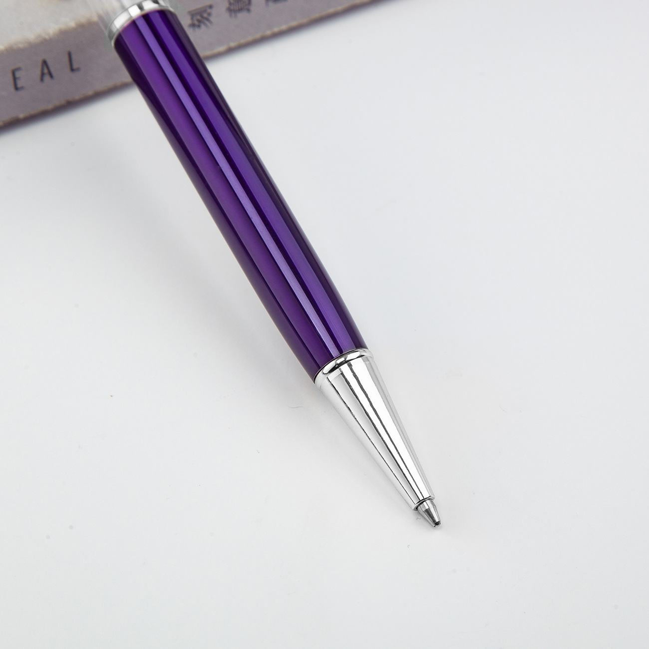 Fábrica al por mayor de metal creativo bolígrafo DIY impresión pluma de cristal japonés y coreano llenado de aceite tubo vacío bolígrafo