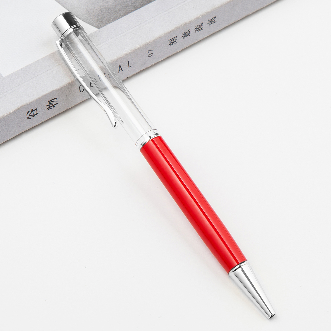 Fábrica al por mayor de metal creativo bolígrafo DIY impresión pluma de cristal japonés y coreano llenado de aceite tubo vacío bolígrafo