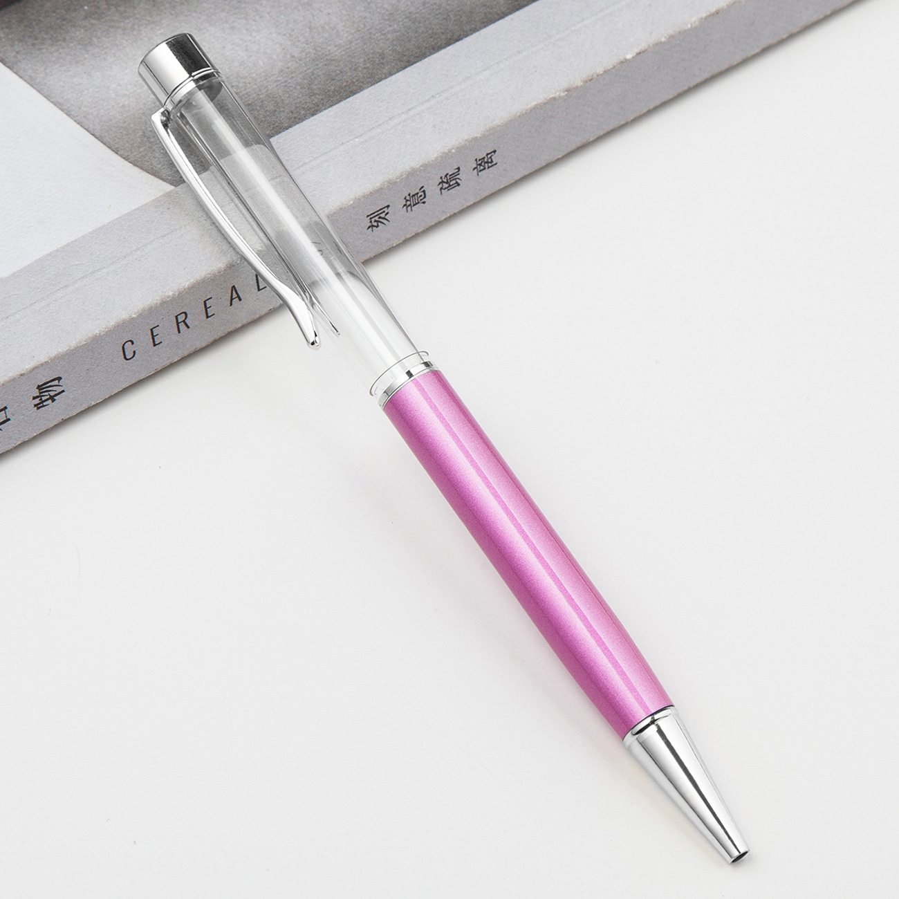 Fábrica al por mayor de metal creativo bolígrafo DIY impresión pluma de cristal japonés y coreano llenado de aceite tubo vacío bolígrafo