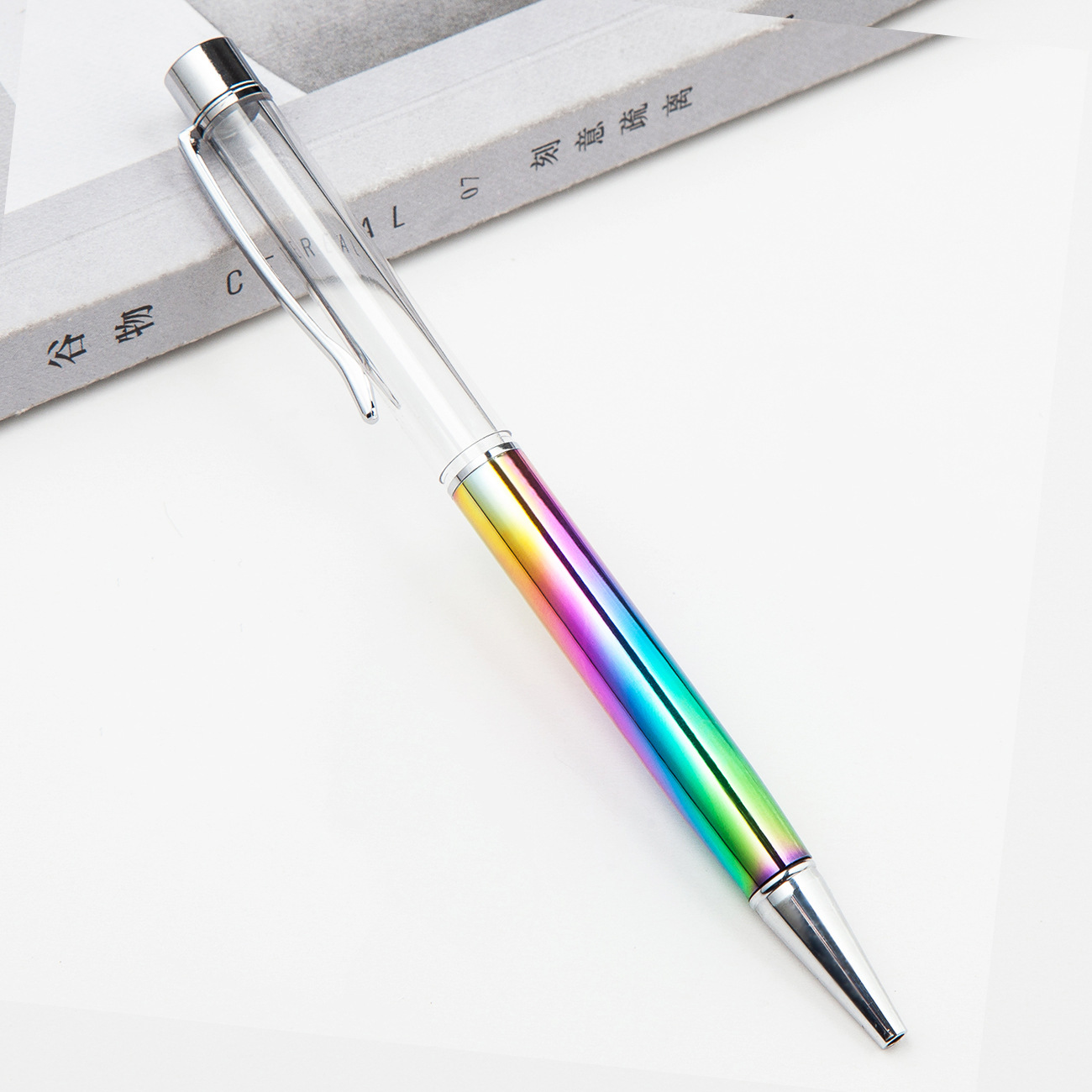 Fábrica al por mayor de metal creativo bolígrafo DIY impresión pluma de cristal japonés y coreano llenado de aceite tubo vacío bolígrafo