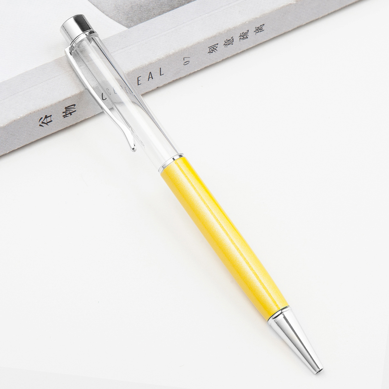 Fábrica al por mayor de metal creativo bolígrafo DIY impresión pluma de cristal japonés y coreano llenado de aceite tubo vacío bolígrafo