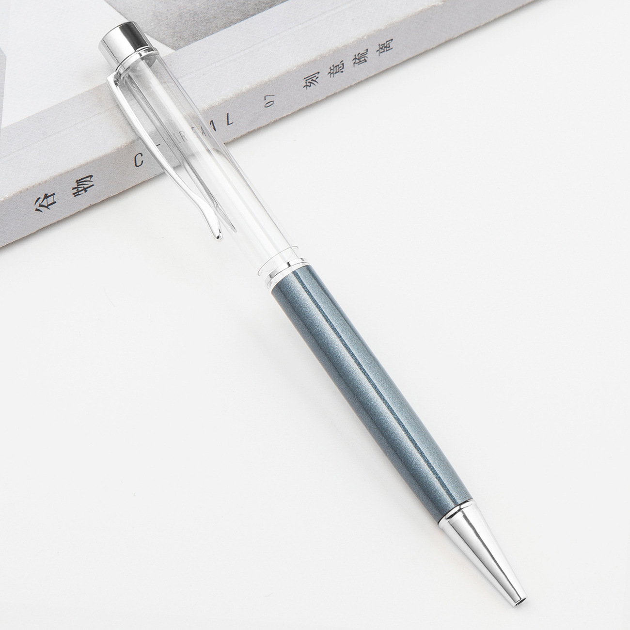 Fábrica al por mayor de metal creativo bolígrafo DIY impresión pluma de cristal japonés y coreano llenado de aceite tubo vacío bolígrafo