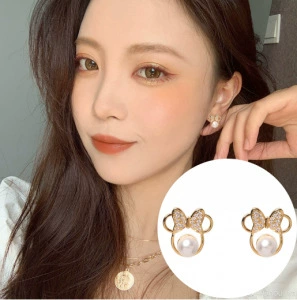 Korean cute earrings pearl with bow, simple and elegant design, internet celebrity