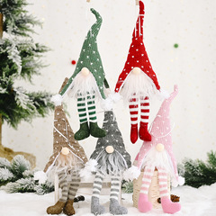 豪貝のクリスマスの装飾用品の森林の老人は明かりを持って足を掛けます。
