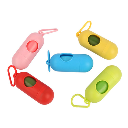 Cross-border new pet outdoor convenient waste bag storage container, pill-shaped cleaning box, dog poop scooper