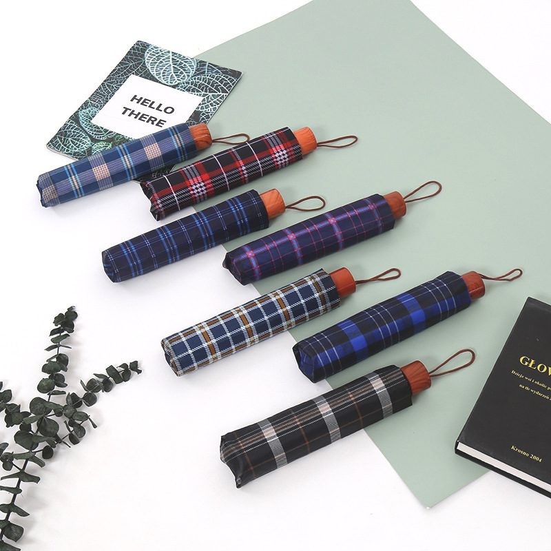 Supply fresh 10k polyester plaid men's and women's dual-use folding sun umbrella advertising logo