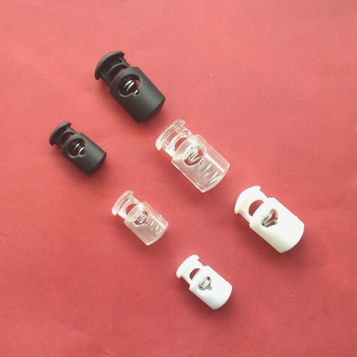 Manufacturer supplies black and white nylon spring buckle single hole oval plastic rope buckle flat rope buckle