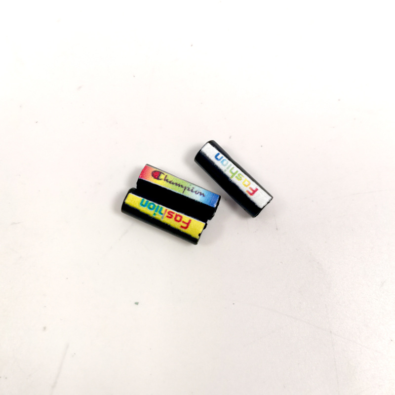 圆柱体彩色丝印绳头扣 箱包鞋服松紧带走马带金属吊钟装饰绳头扣