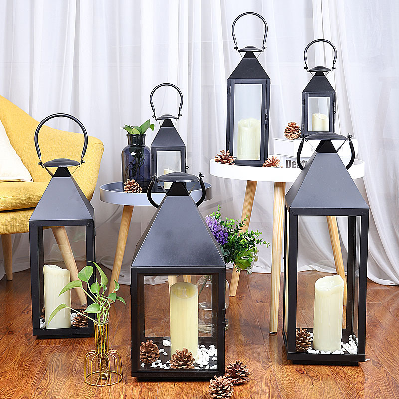 Fábrica directa nórdico hierro viento lámpara candelabro metal artesanía de vidrio retro romántico creativo vela decoración