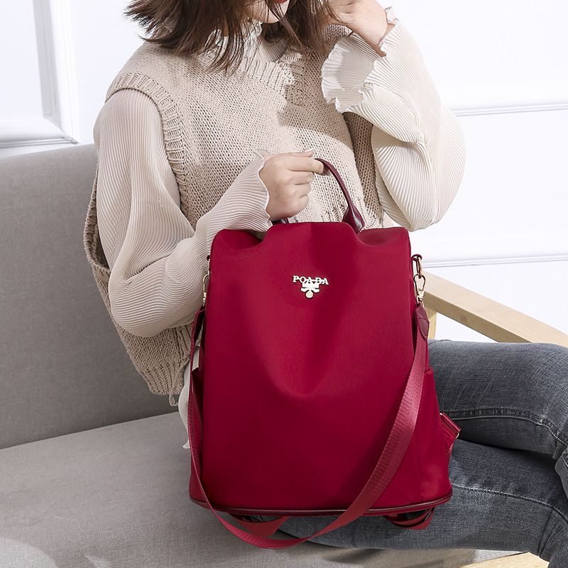 Fábrica transfronteriza al por mayor Mochila para mujer 2021 Nuevo estilo coreano de moda Oxford tela al aire libre mochila antirrobo personalizada para mujer