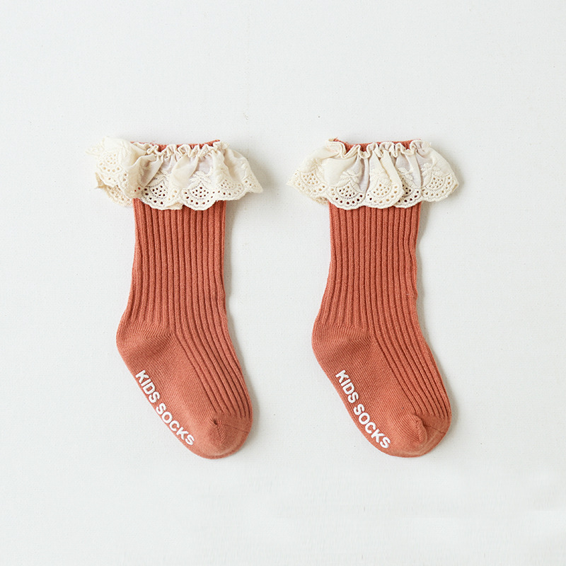 Calcetines para niños Primavera y otoño nuevos calcetines de media pantorrilla de encaje de color puro para niñas calcetines para bebés sin hueso Calcetines antideslizantes para bebés