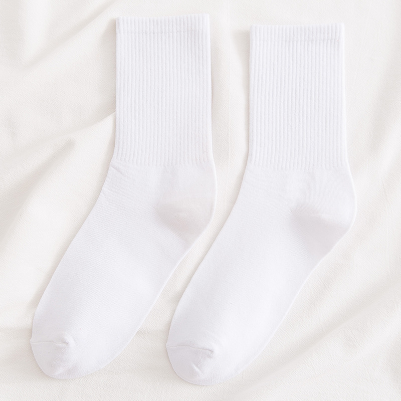 Calcetines de mujer Otoño e Invierno Algodón de color sólido calcetines de pila ins calcetines de mujer de moda Deportes japoneses medias de media pantorrilla elásticas altas