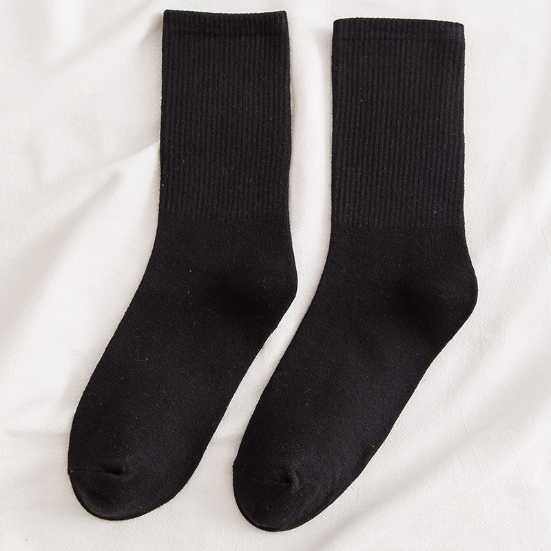 Calcetines de mujer Otoño e Invierno Algodón de color sólido calcetines de pila ins calcetines de mujer de moda Deportes japoneses medias de media pantorrilla elásticas altas