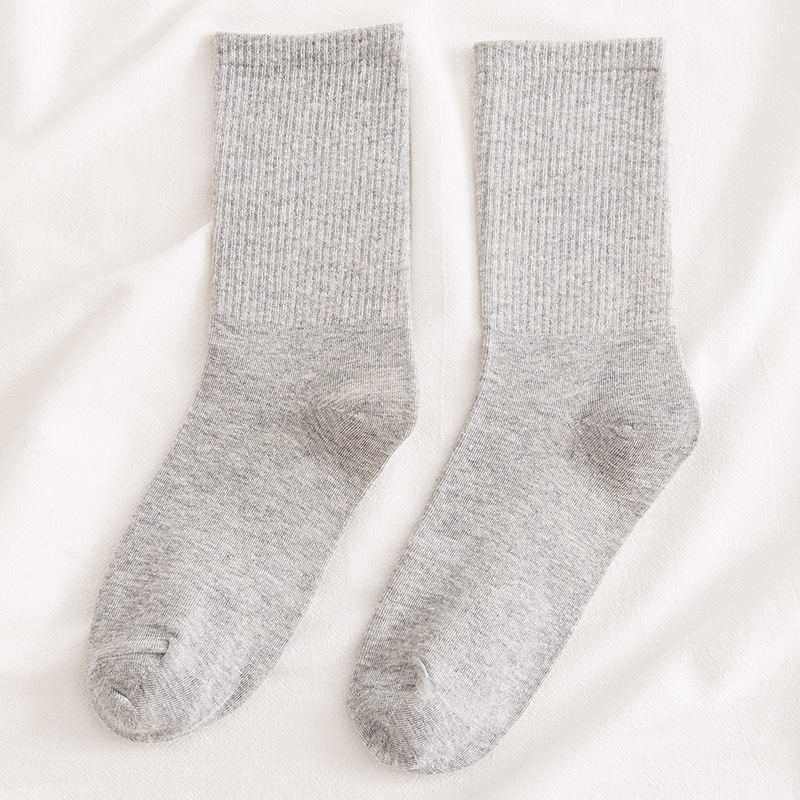 Calcetines de mujer Otoño e Invierno Algodón de color sólido calcetines de pila ins calcetines de mujer de moda Deportes japoneses medias de media pantorrilla elásticas altas