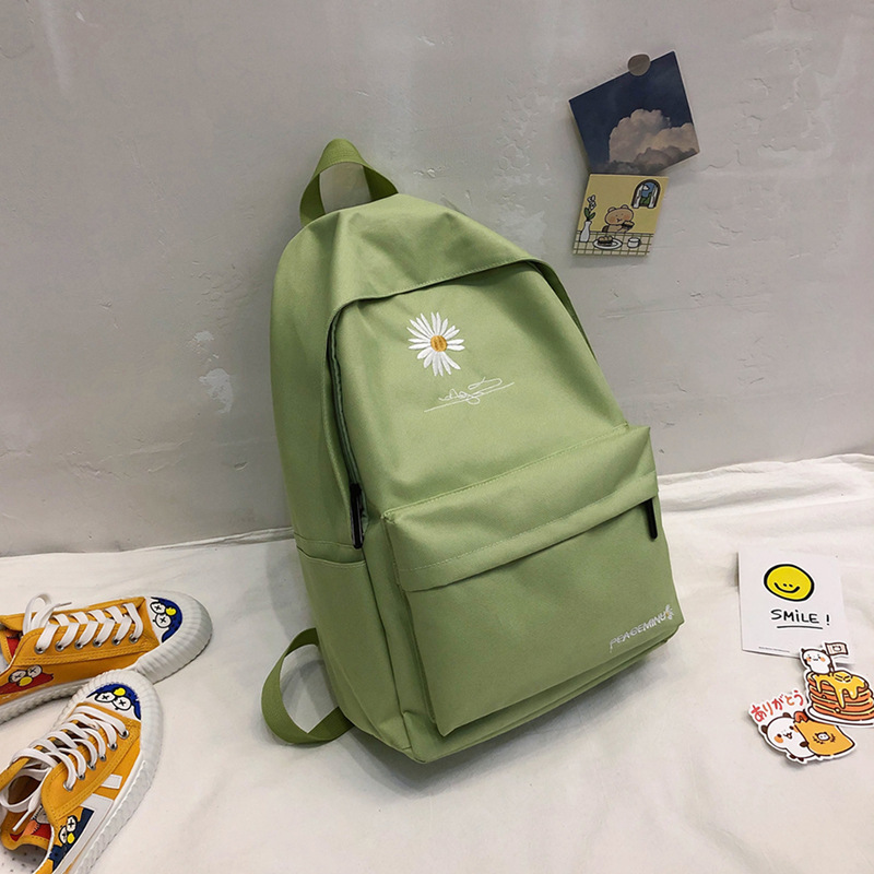 2023 nueva mochila de estudiantes coreana pequeña mochila de margarita versátil gran capacidad mochila de viaje coreana suministro de mercado nocturno