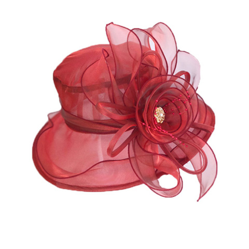 Dam solhatt i organza med brett brätte och stor blomma_voghion.com