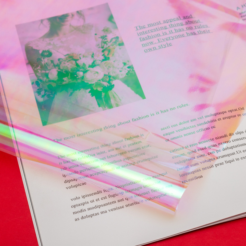 Flor de IRIS de colores papel de embalaje al por mayor impermeable película de color mágico película láser color transparente flor tienda ramo material de embalaje