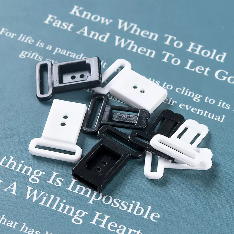 现货供应12MM领结调节扣 黑白色塑料内衣对扣 泳装文胸插扣压扣