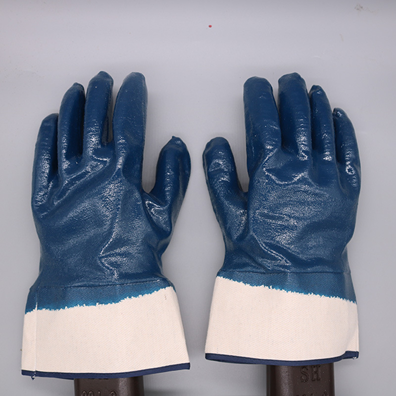 Inmersión grande boca ancha lona azul nitrilo guantes de trabajo a prueba de aceite pegamento colgando adhesivo nitrilo guantes de trabajo resistentes al desgaste