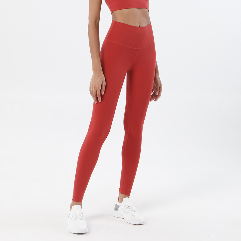 Procesamiento personalizado de dos lados abrasivo desnudo sensación de pantalonada de cintura alta europea y americana para elevar las caderas de miel pescado pantalon deportivo