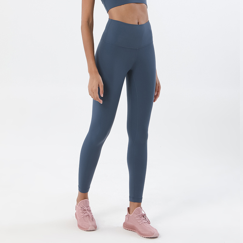 Procesamiento personalizado de dos lados abrasivo desnudo sensación de pantalonada de cintura alta europea y americana para elevar las caderas de miel pescado pantalon deportivo