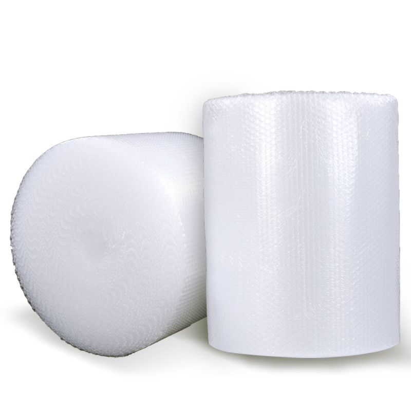 Los fabricantes suministran gran rollo blanco película de burbujas al por mayor embalaje expreso espuma burbuja papel burbuja almohadilla película de embalaje a prueba de golpes