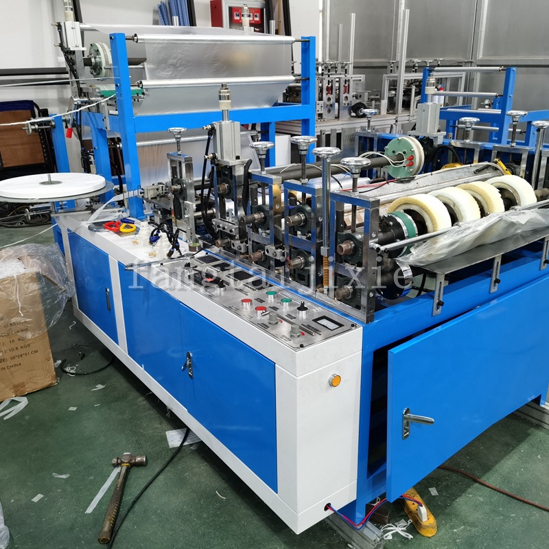 厂家推荐一次性pe袖套机 PE塑料袖套机 无纺布袖套机器设备