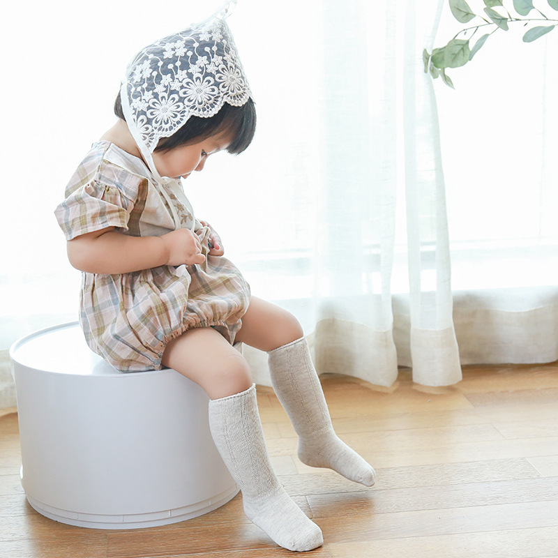 20 nuevos calcetines de pila para niños otoño color sólido bebé calcetines largos de algodón cabeza de costura sin hueso bebé hasta la rodilla calcetines de media pantorrilla