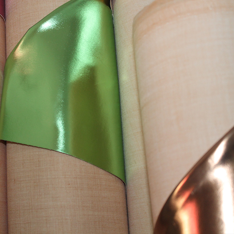 义乌厂家直销新款贴膜PVC七彩革人造革箱包汽车沙发装饰皮料